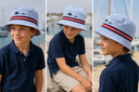 Maritim bøllehat JUNIOR, bomuld, blå/hvid seersucker striber