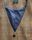 Lea tweed vest, Harris Tweed, sand sildebensmønster m. rød/lysblå overtern